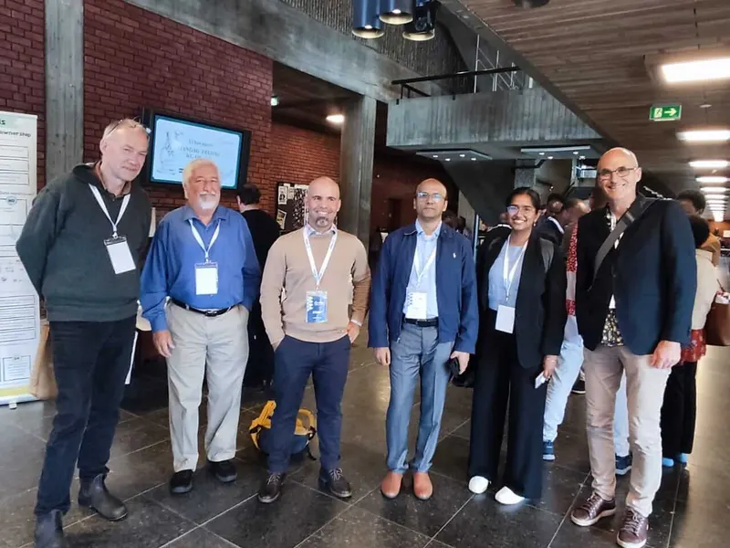 SoftWorks team with partners at the conference